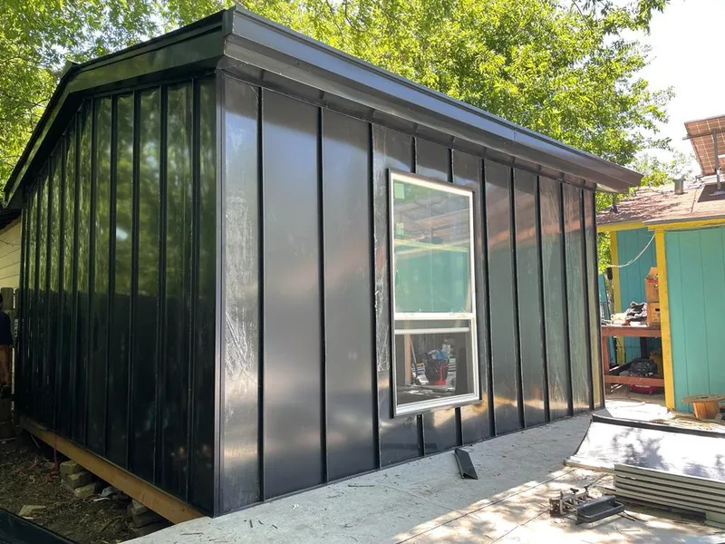 Black standing seam metal wall panels for Metal Roof Installation in Kingsford